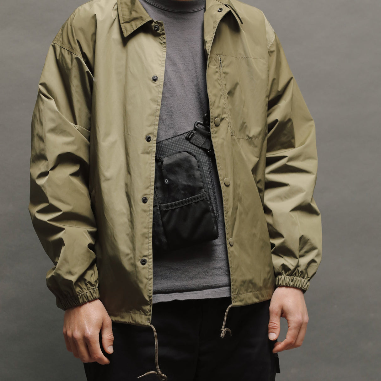 Sling Pouch Slim - Laukku