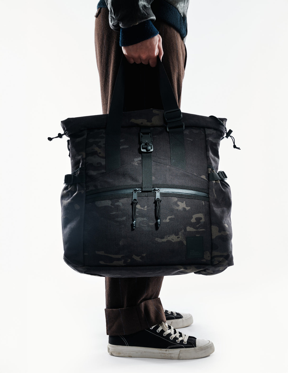 the-brown-buffalo-conceal-tote-edc-laptop-bag-weather-resistant-everyday-use-1000d-nylon-multicam-black_edited.jpg