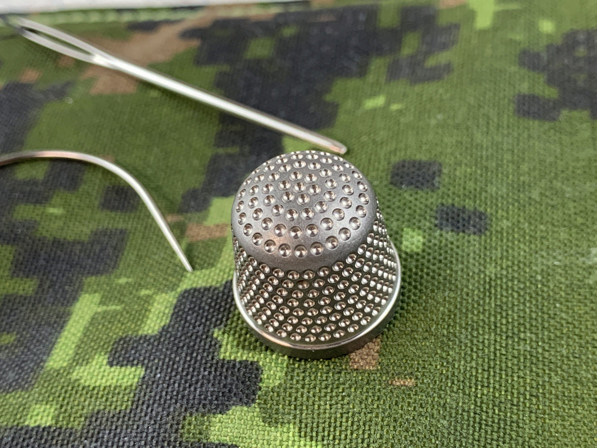 Titanium Thimble - Sormustin