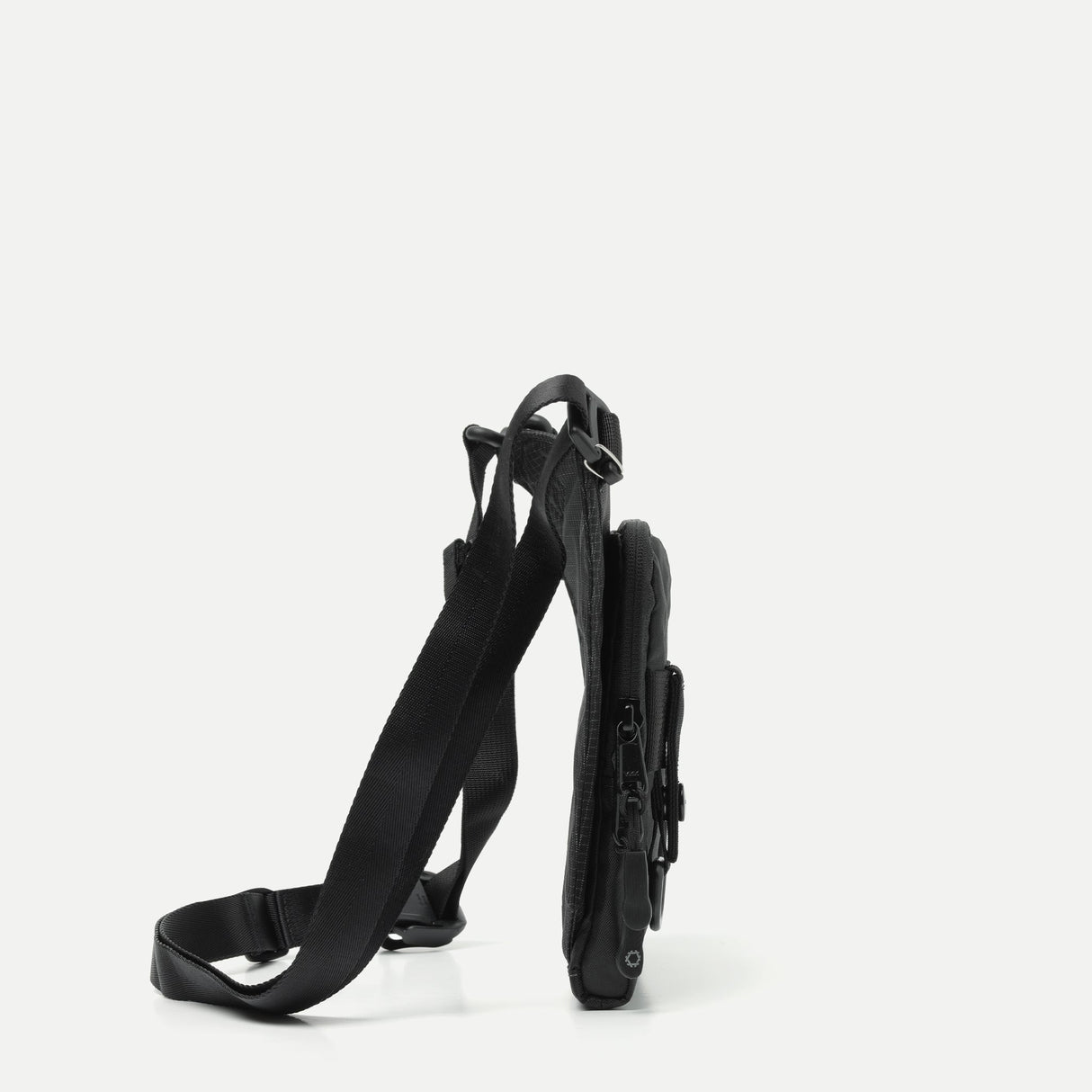 Sling Pouch Slim - Laukku